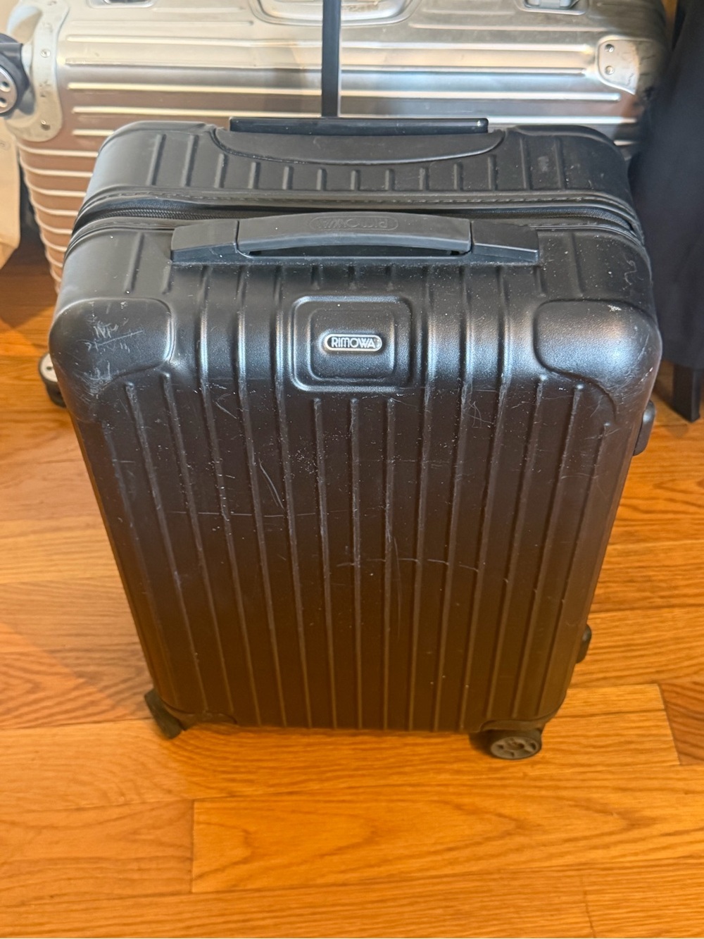 Rimowa black carryon suitcase
